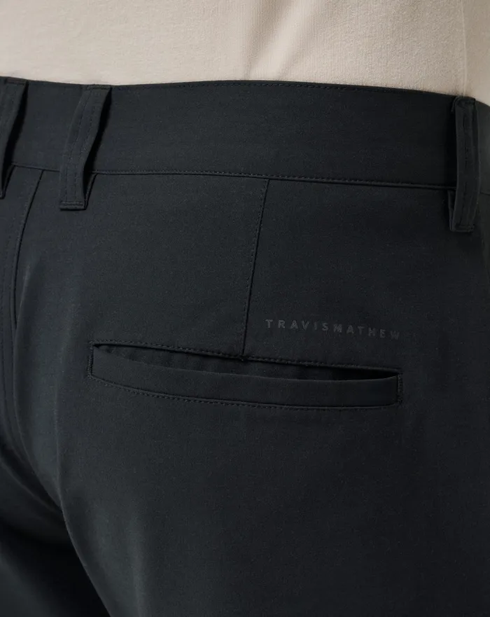 Men Shorts TravisMathew TECH CHINO SHORT 8IN Black