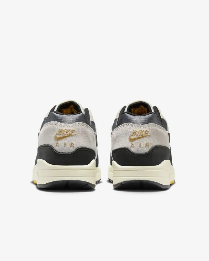 MenWomen Nike Lifestyle Air Max 1 Saillight Boneuniversity Goldblack