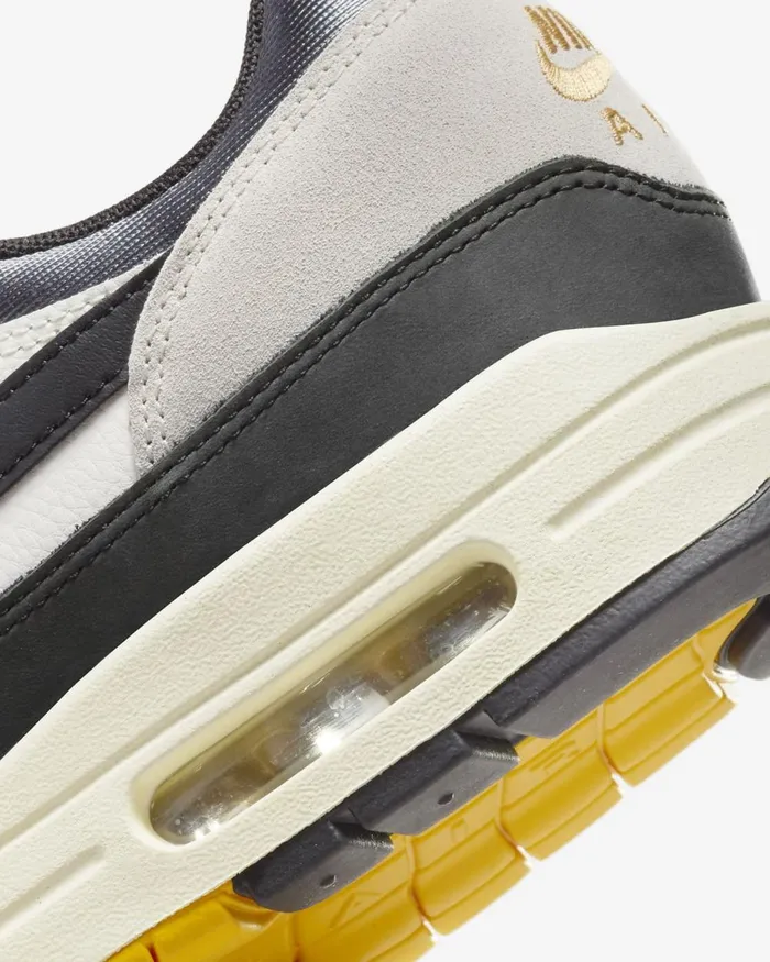 MenWomen Nike Lifestyle Air Max 1 Saillight Boneuniversity Goldblack