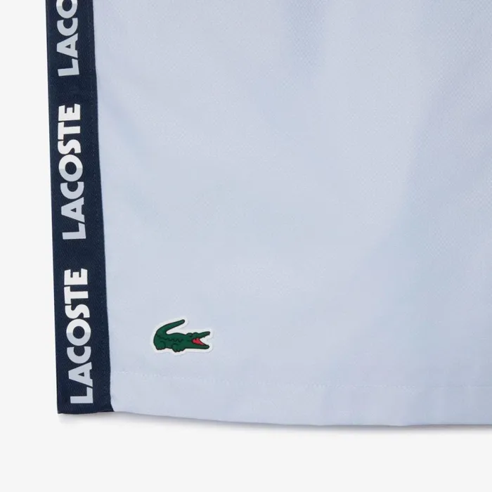 Shorts and Swim Men Lacoste Men039s Logo Stripe Tennis Shorts Light Blue Navy Blue X1j