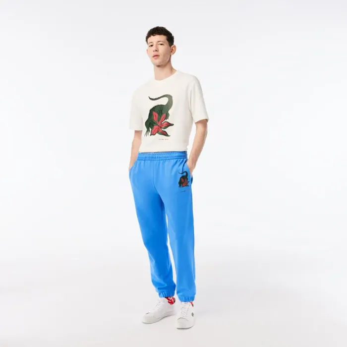 Sweatpants and Trousers Men Lacoste Mens Lacoste X Netflix Croc Print Sweatpants Ethereal Blue L99 Sweatpants and Trousers Men Lacoste Mens Lacoste X Netflix Croc Print Sweatpants Ethereal Blue L99
